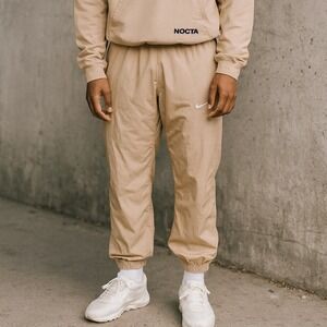 Nike Nocta Northstar Track Pants Mens Small‎ Tan Nylon Joggers Drake Ankle Zip